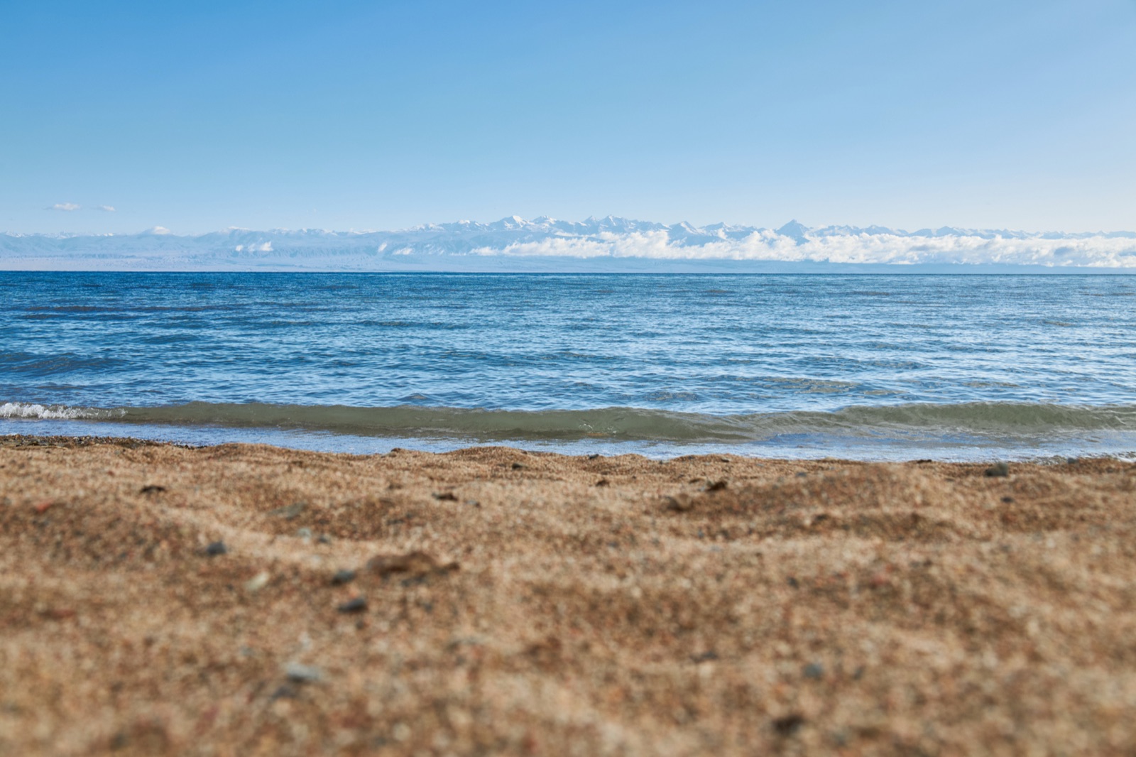 Lake Issyk-Kul panoramic view with Tian Shan mountains